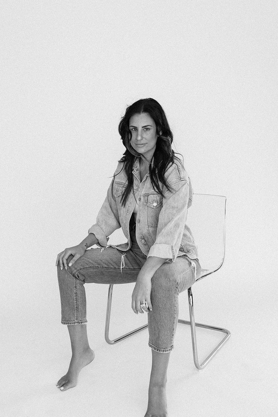 Woman sitting, black and white photograph, Lauren Hollis, studio shoot, business head shot